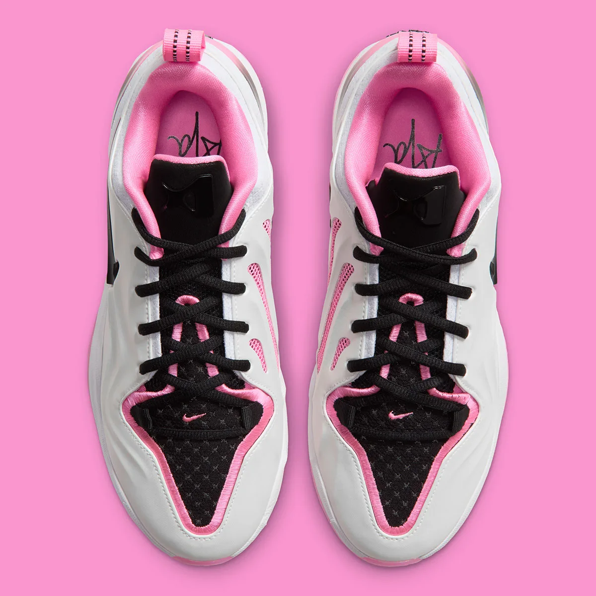 Top-down view of pair, black laces, pink collar lining, black mesh toe box and pink stitched trim, Cruise Control