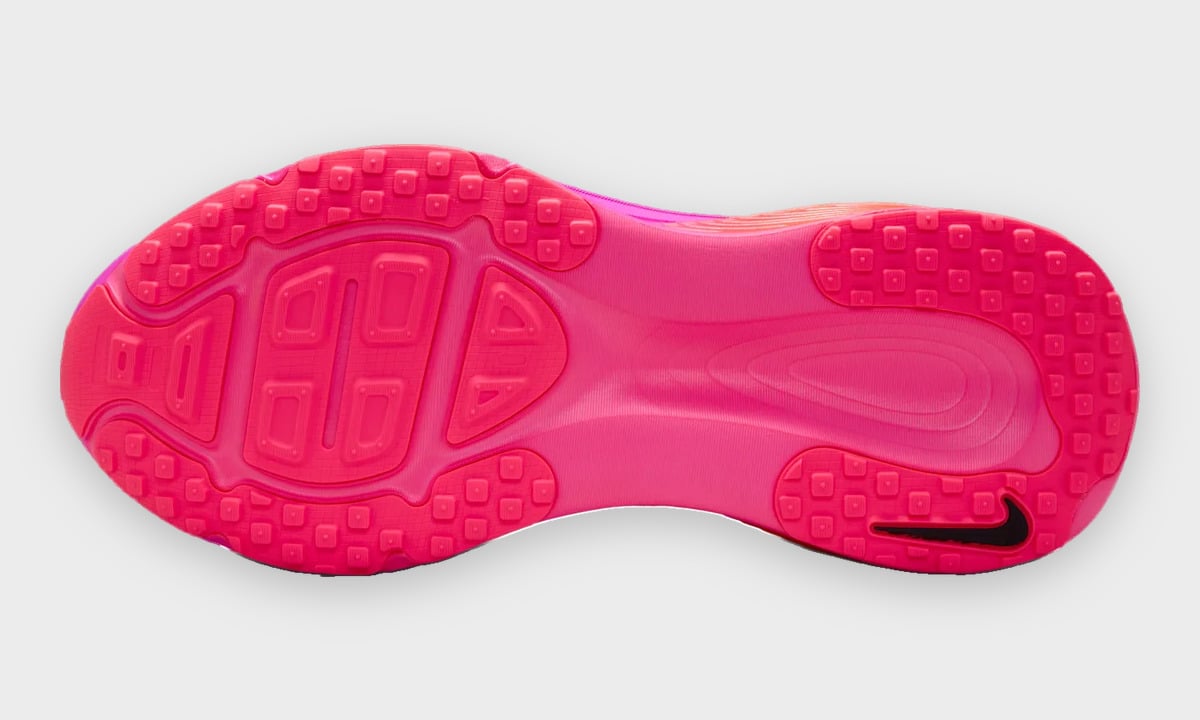 Outsole view with pink square tread blocks and a small black Swoosh, Dark Tour Collection