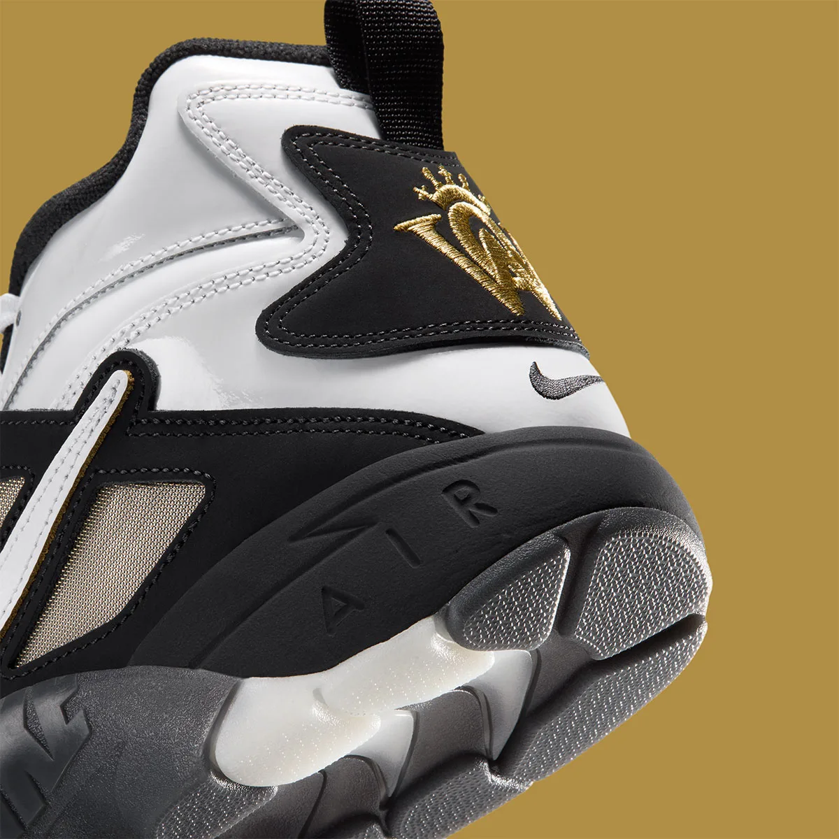Heel detail, gold crown embroidery on black tab, embossed Air lettering, white sole unit, White/Black