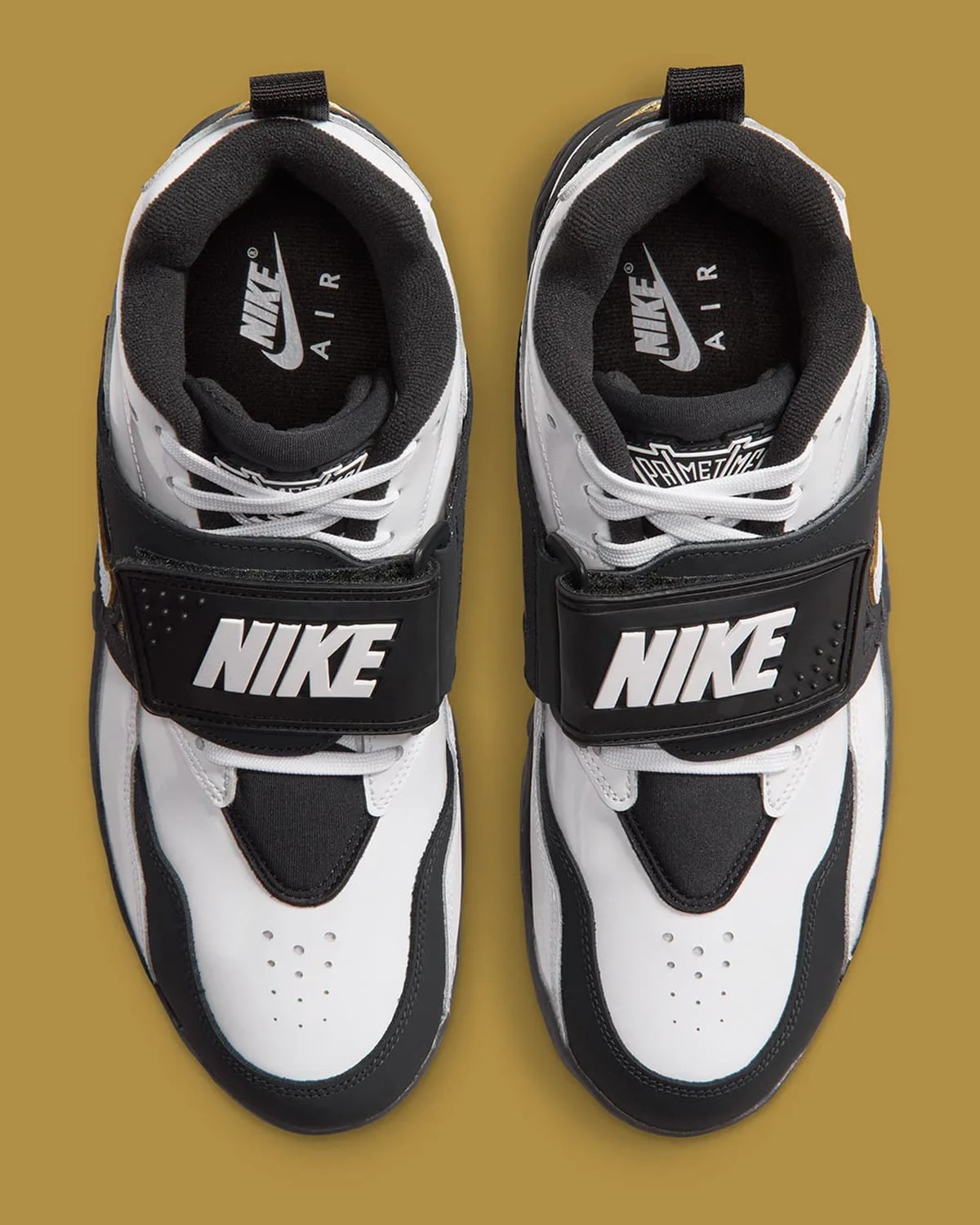 Top-down view of pair, black straps with white Nike lettering, Nike Air insoles, White/Black