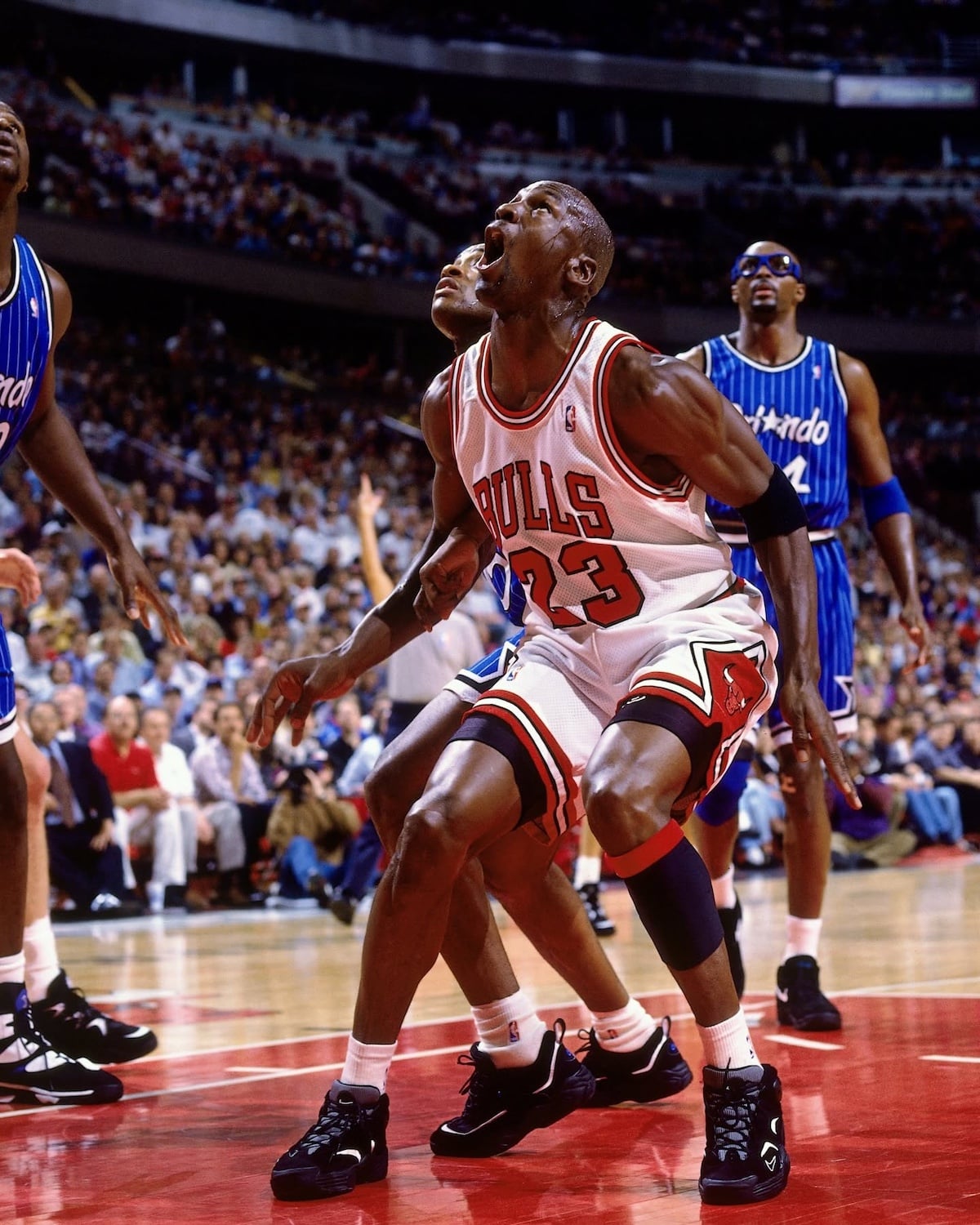 Michael Jordan boxes out Orlando Magic players in Game 3 of the 1995 Eastern Conference Semifinals, wearing the Nike Air Flight One