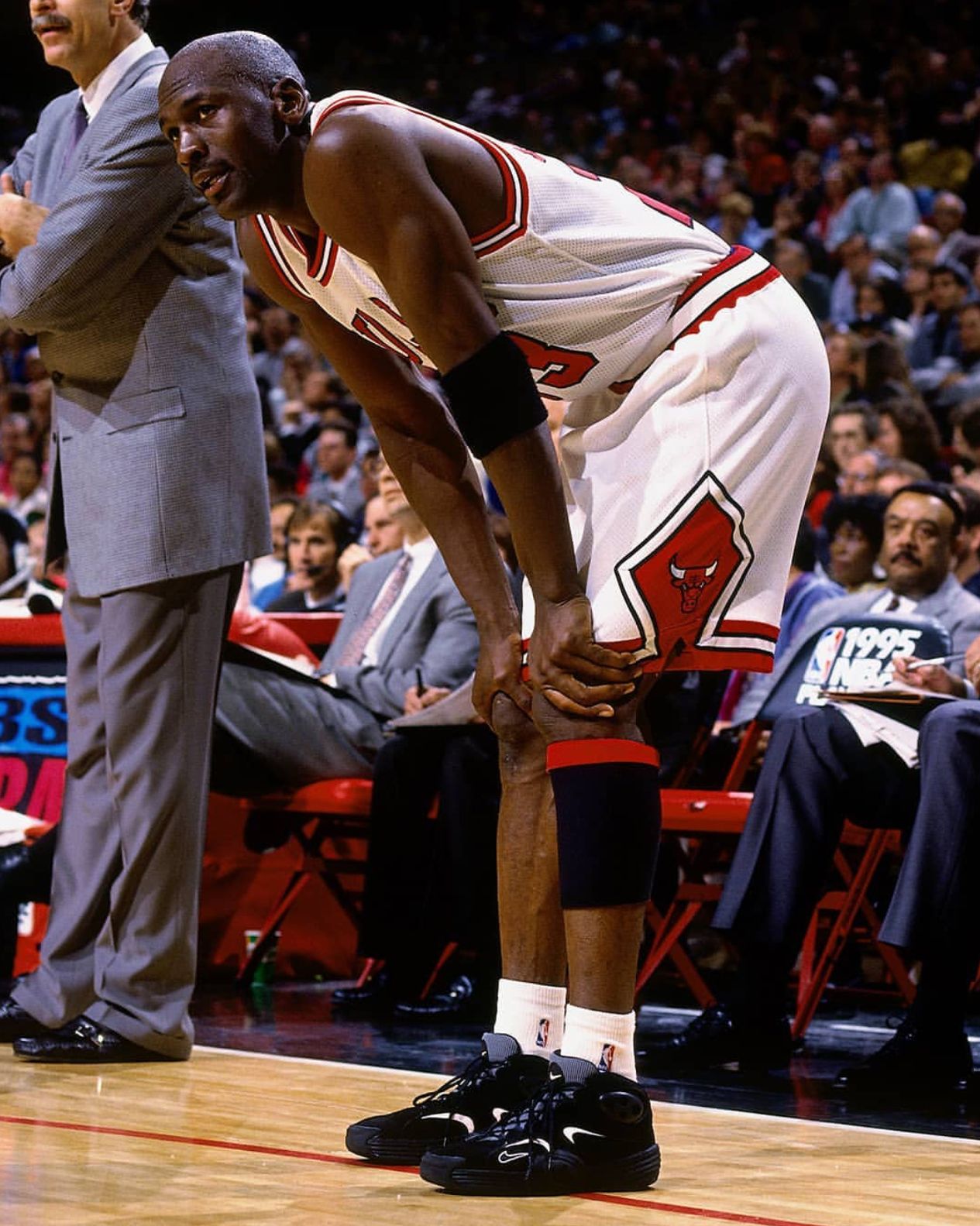 Michael Jordan at the sideline in the Nike Air Flight One “Black/White” during the 1995 NBA Playoffs