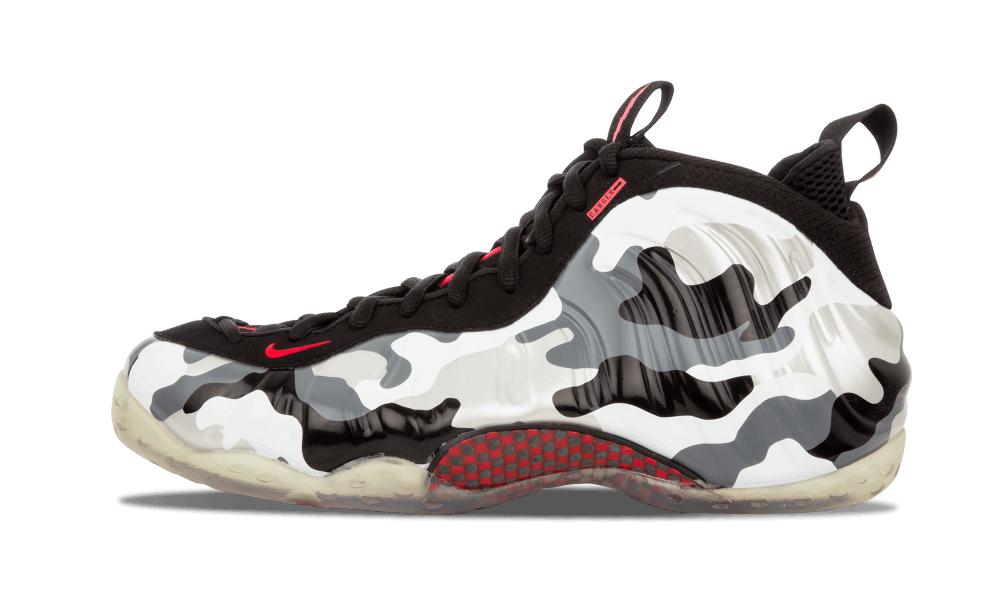 Lateral view on white background, black, white and grey camo shell with red Nike swoosh and red mesh panel, Fighter Jet