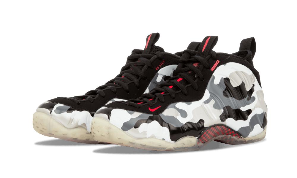 Pair at three-quarter angle, black laces, grey and white camo, red swoosh and 'No step' text, Fighter Jet