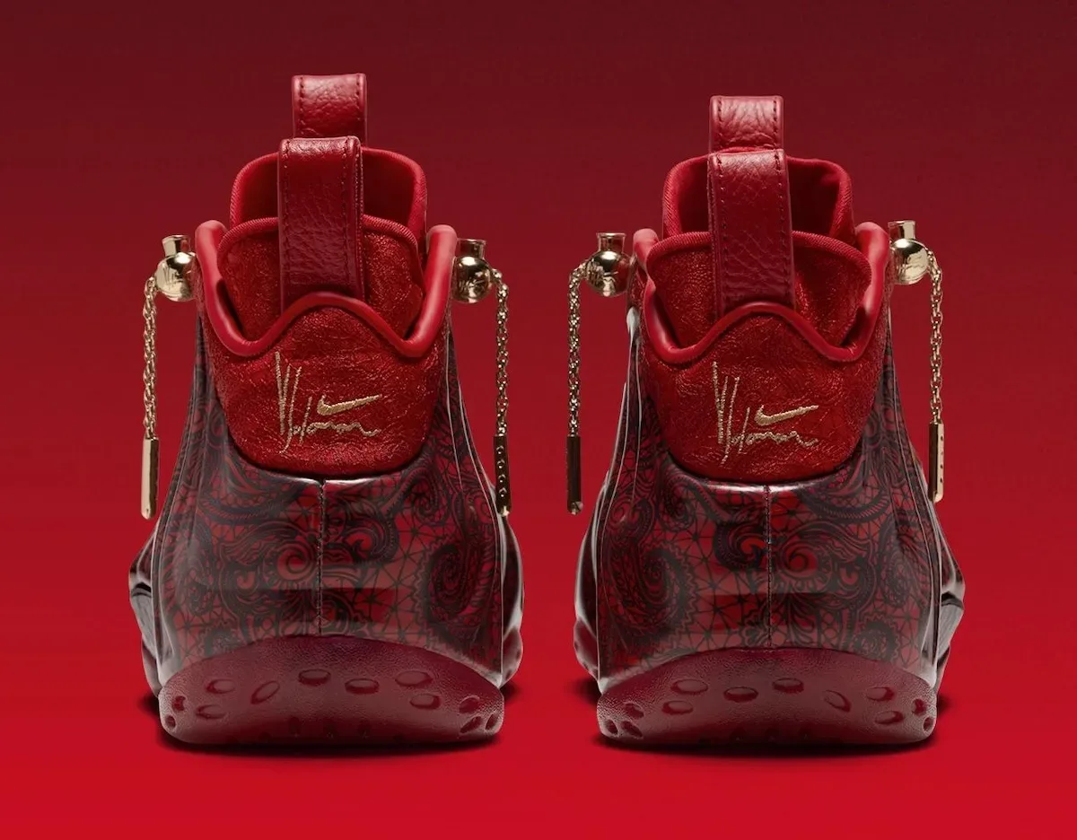 Pair from the heel, gold signature and swoosh on red heel tab, gold lace charms at the collar, Gym Red