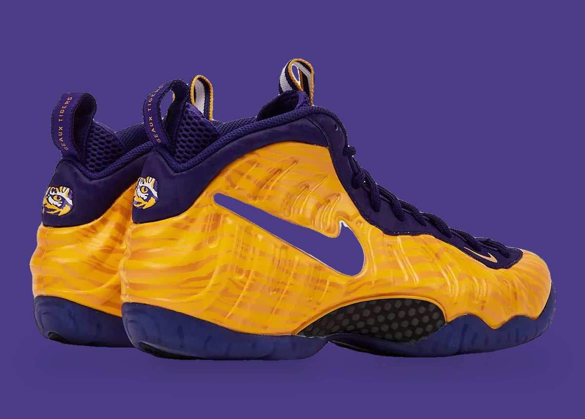Pair from the heel and lateral side, gold tiger-stripe shells, tiger-eye heel logos, purple tabs, LSU Tigers