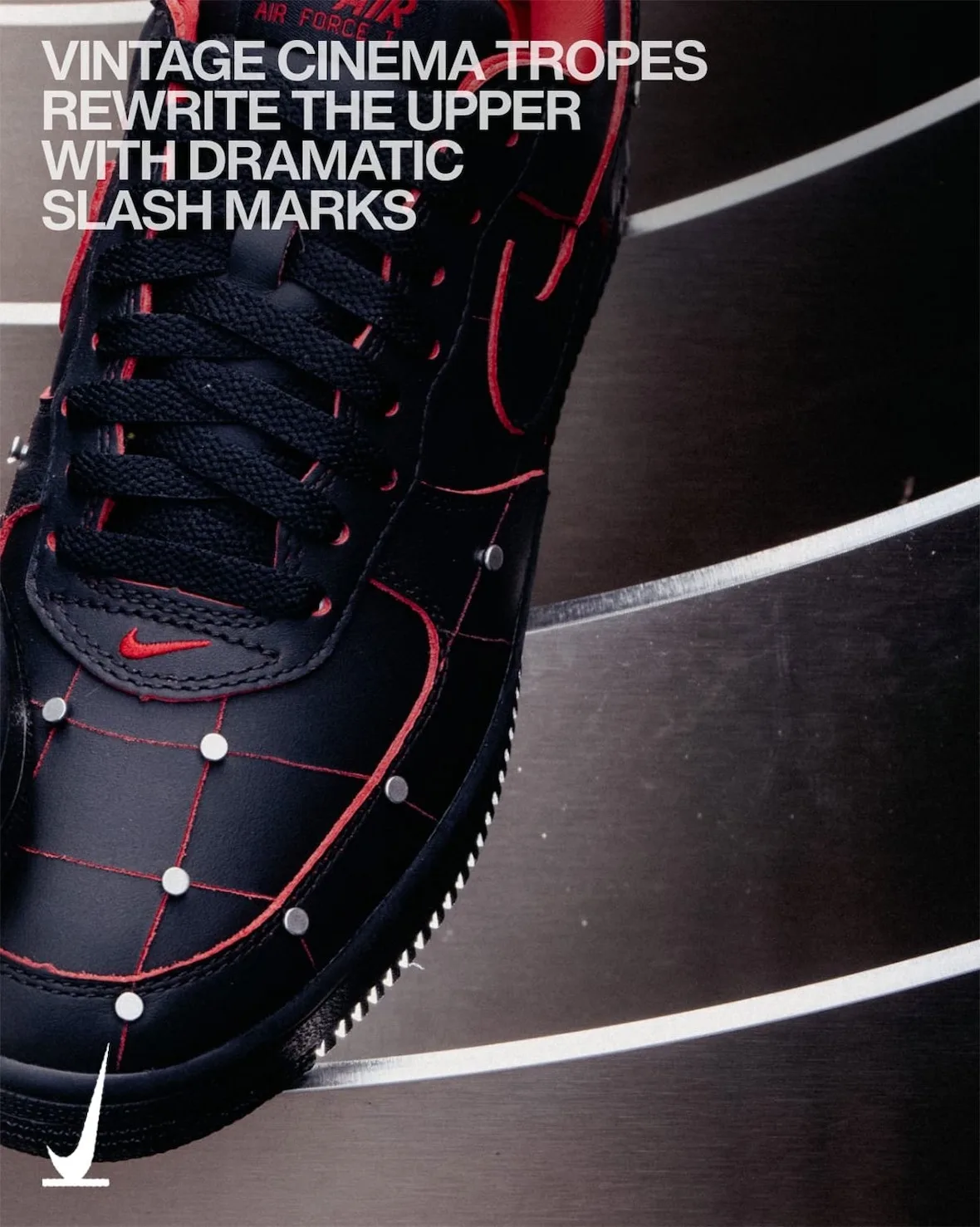 Detail of black upper with red grid stitching and silver studs against steel blades, slash marks headline, Nightmare