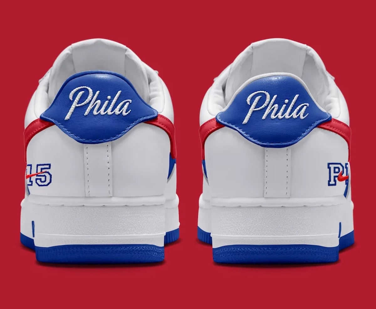 Heel view of pair, blue tabs with white Phila script, 15 and PH numerals on red, Philly