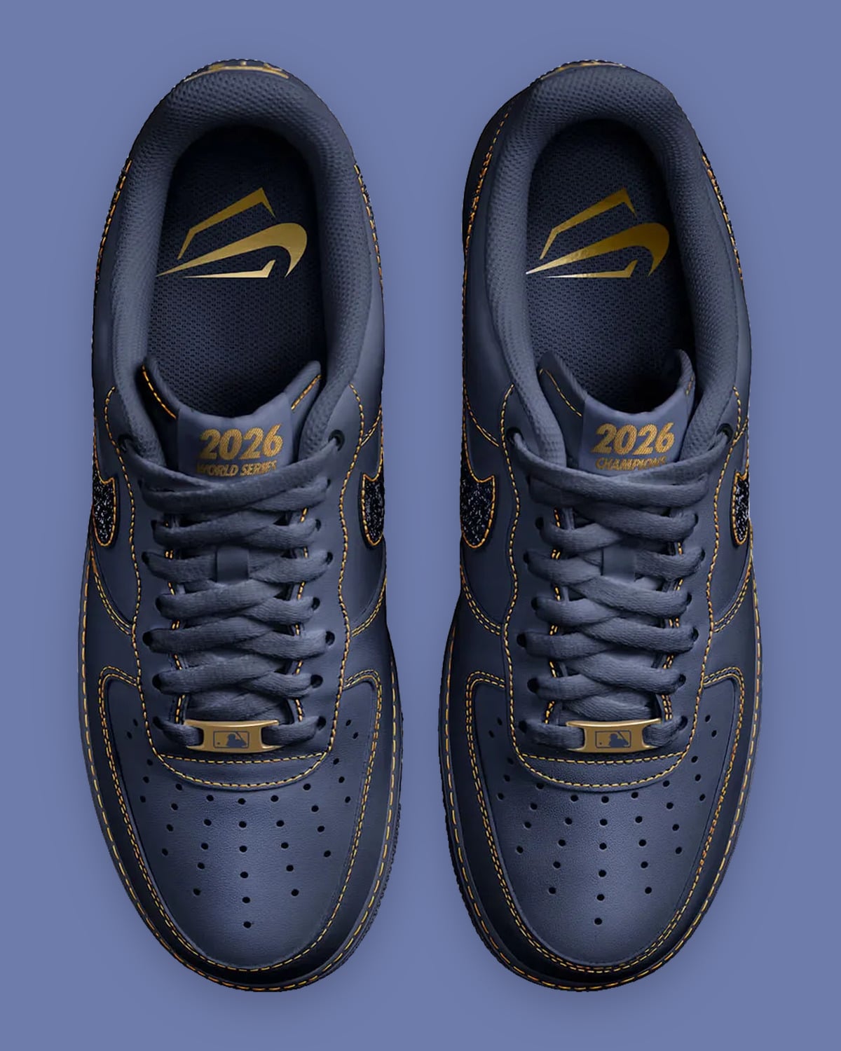 Top-down pair, gold 2026 tongue text, gold swoosh insoles, gold lace-tip tags, navy laces, Milwaukee Brewers