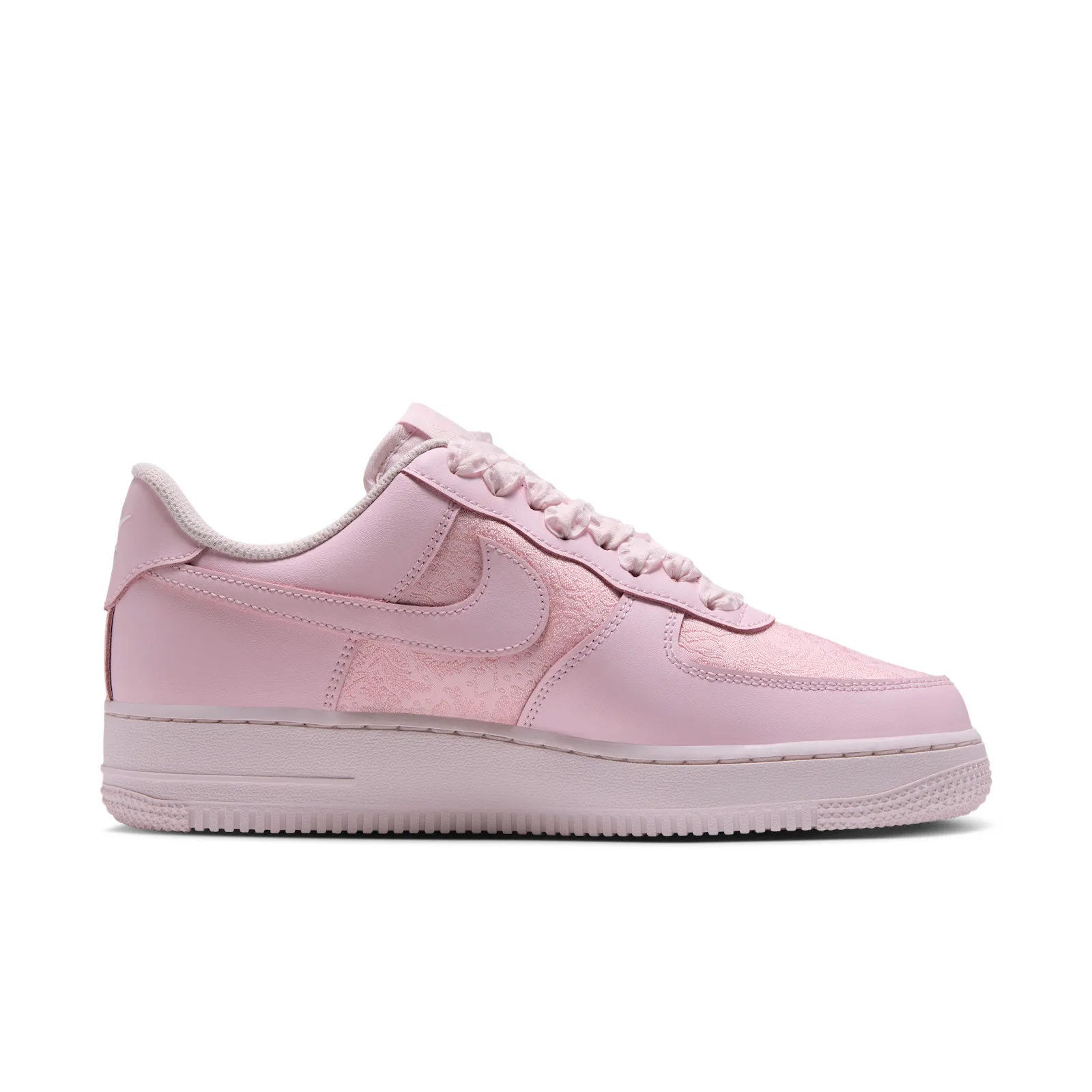 Lateral view of the Arctic Pink, Drops during Holiday 2026 via Nike.com and select retailers