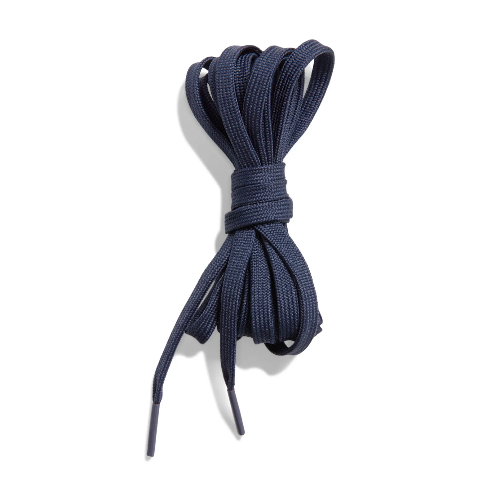 Navy flat laces coiled in a bundle on white background, Thunder Blue