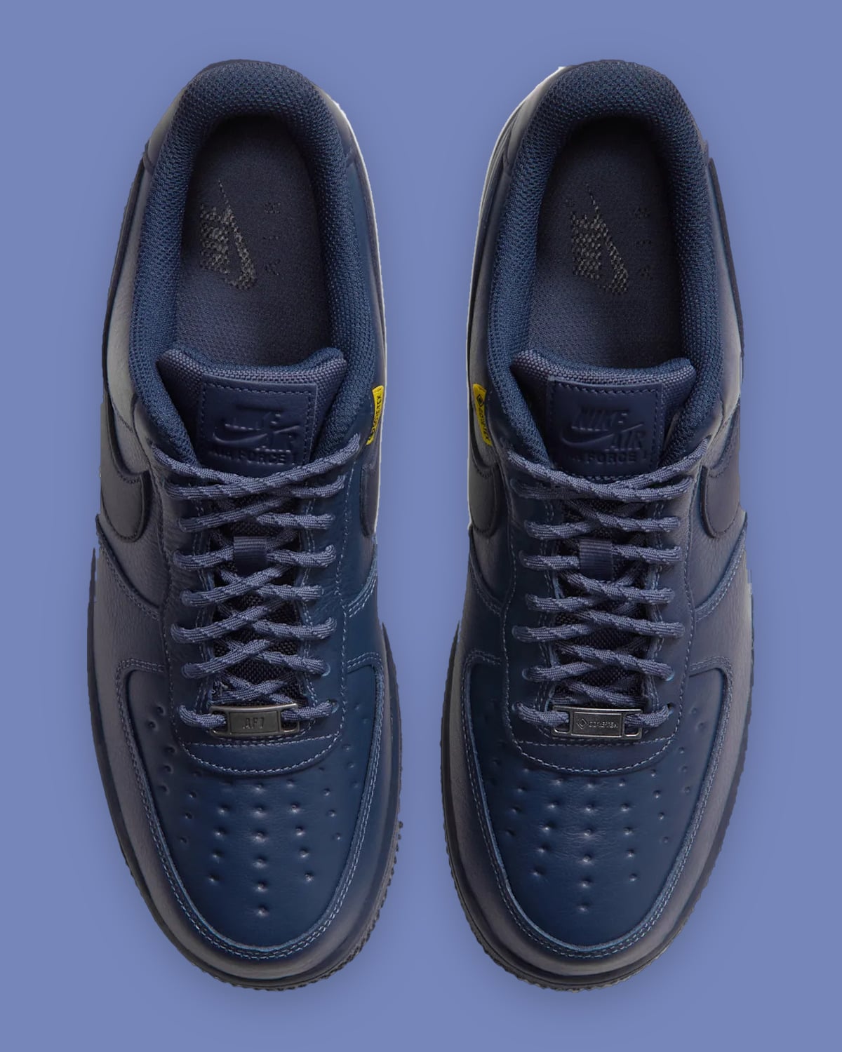 Top-down view of pair, navy laces, metal lace dubraes and embossed tongue labels, Thunder Blue
