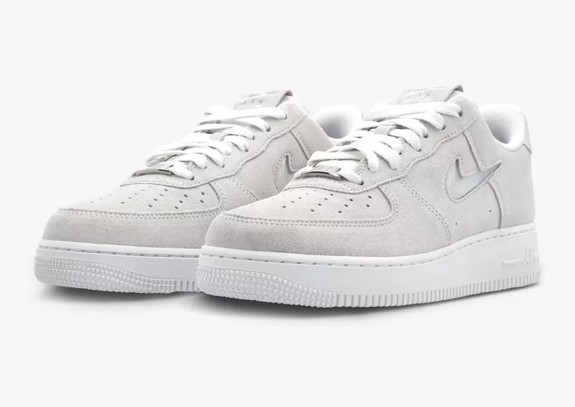 Front three-quarter view of the pair of Las Vegas Aces, It launched exclusively through the WNBA Store, Nike Air Force 1 Low