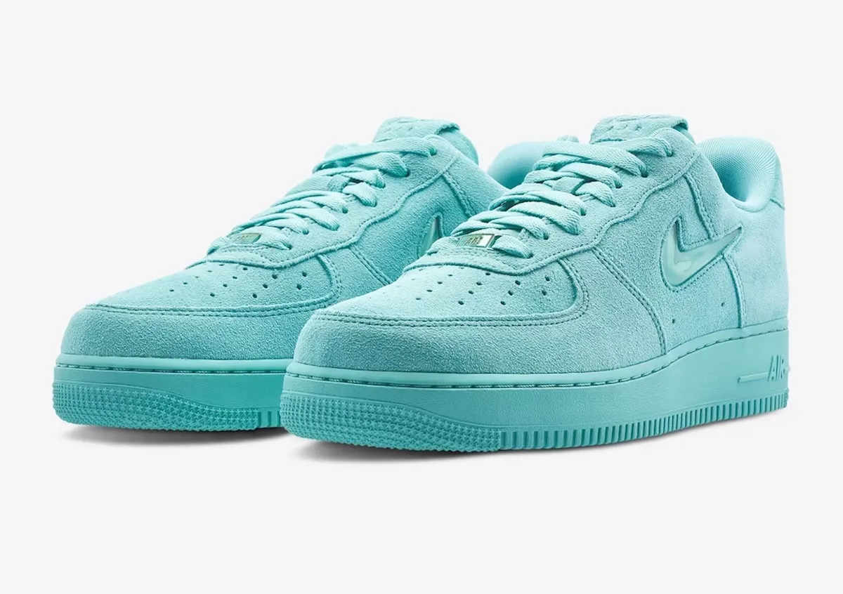 Front three-quarter view of the pair of Las Vegas Aces, It launched exclusively through the WNBA Store, WNBA Air Force 1