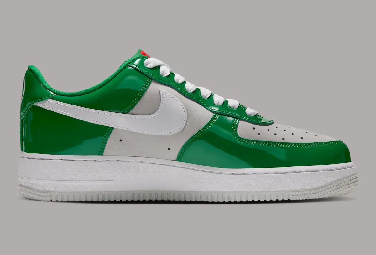 Medial view with glossy green overlays and a white Swoosh, Pine Green