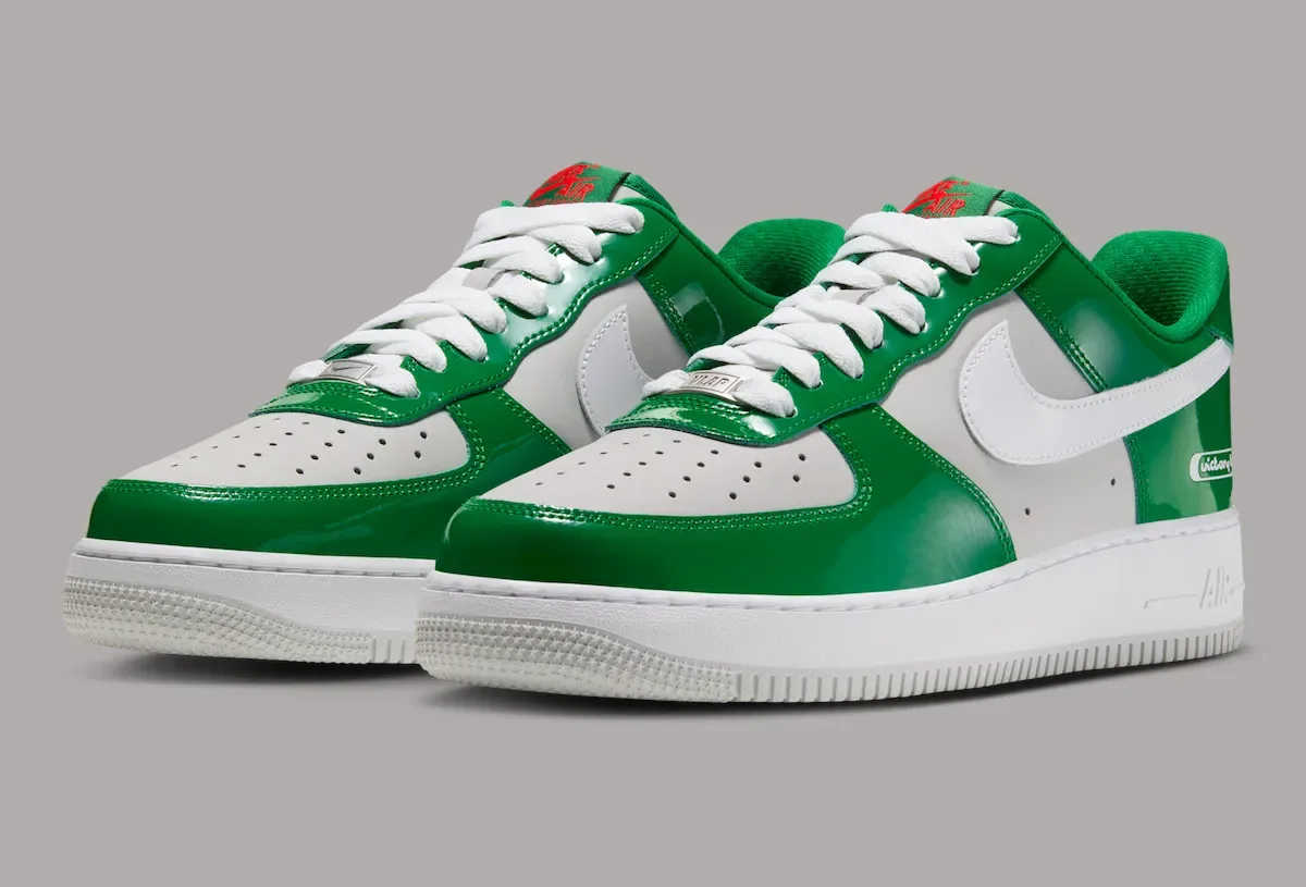 Pair at a front angle with glossy green overlays and white laces, Pine Green