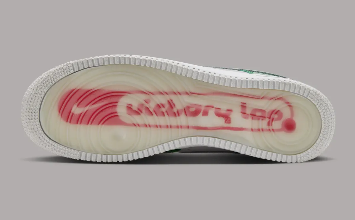Outsole view with translucent rubber revealing red Victory Lap branding, Pine Green