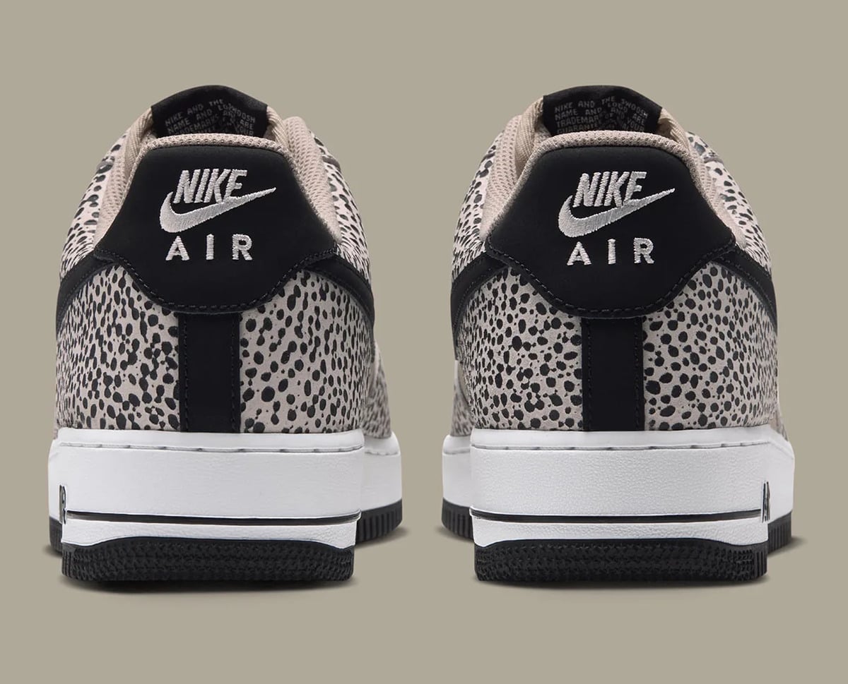 Heel view of pair, white Nike Air embroidery on black tabs, dotted panels, Safari