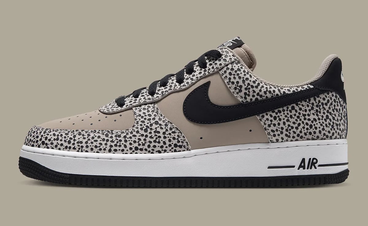Lateral view, black swoosh, dotted overlays, taupe leather, white midsole with AIR, Safari