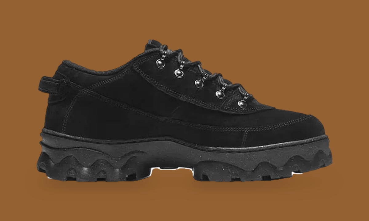 Medial view of all-black suede low boot with black laces and wavy lugged sole, Black