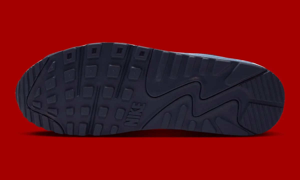 Outsole view, all navy rubber with square tread pattern and Nike logo, Geyser Grey