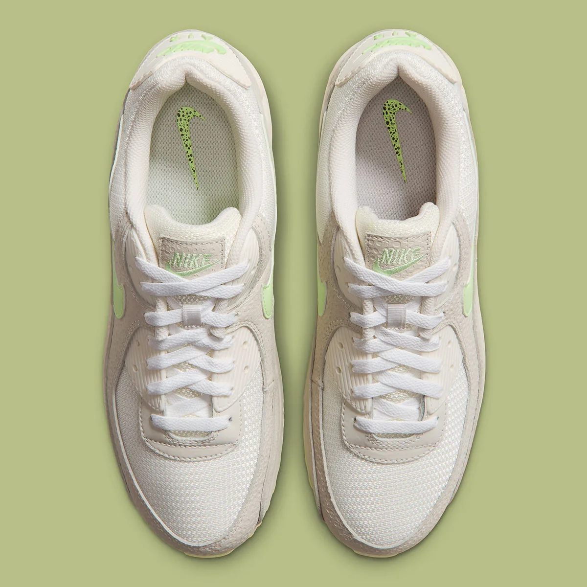 Top-down pair with white laces and green speckled Swooshes on the insoles, Glow In The Dark Safari