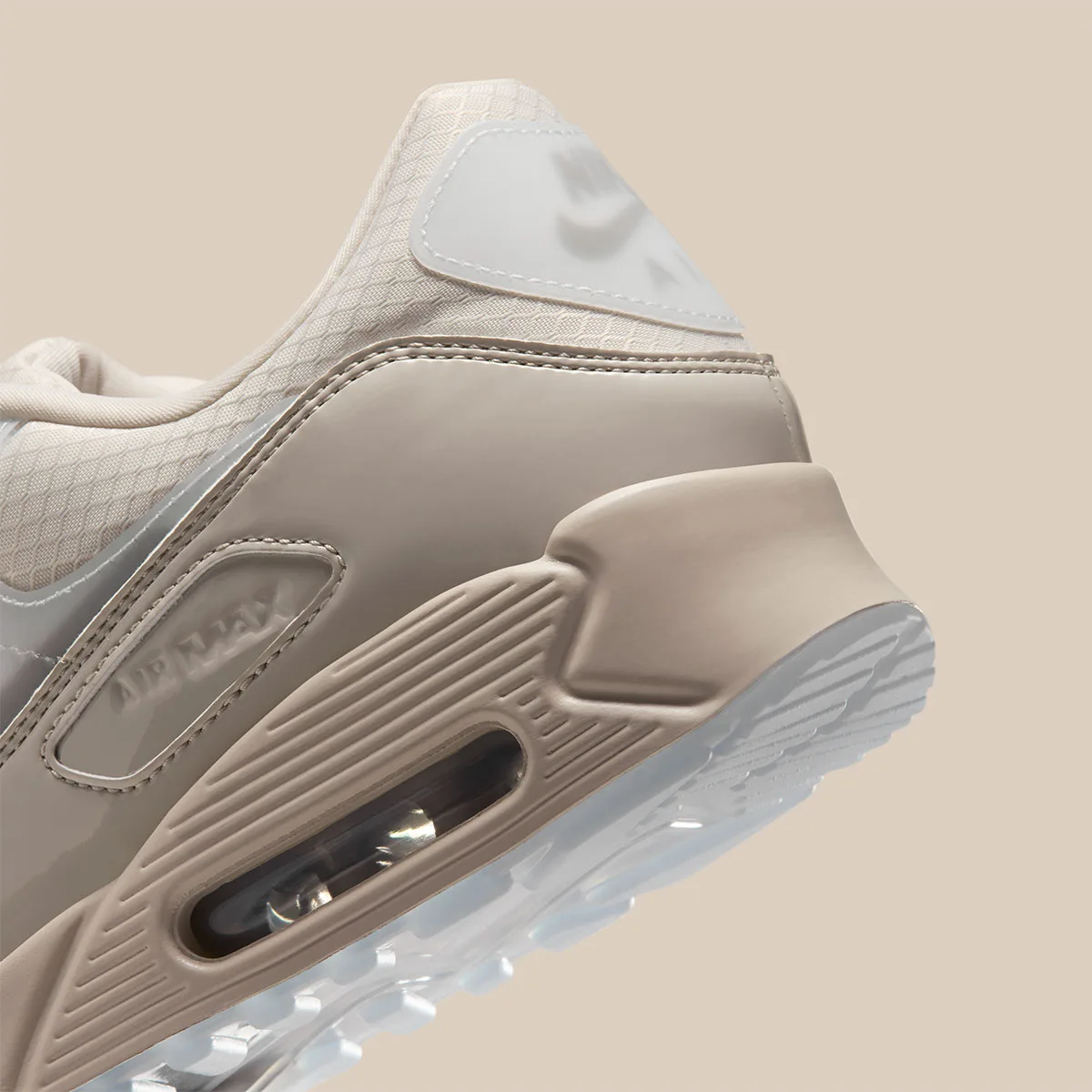 Detail of heel with glossy taupe panels, Air window and translucent icy outsole, Light Orewood Brown