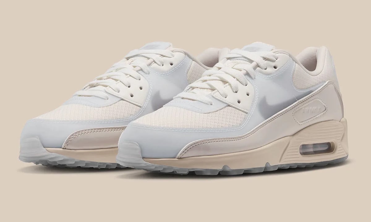 Pair, three-quarter view on beige backdrop with pale grey Swoosh overlays, Light Orewood Brown