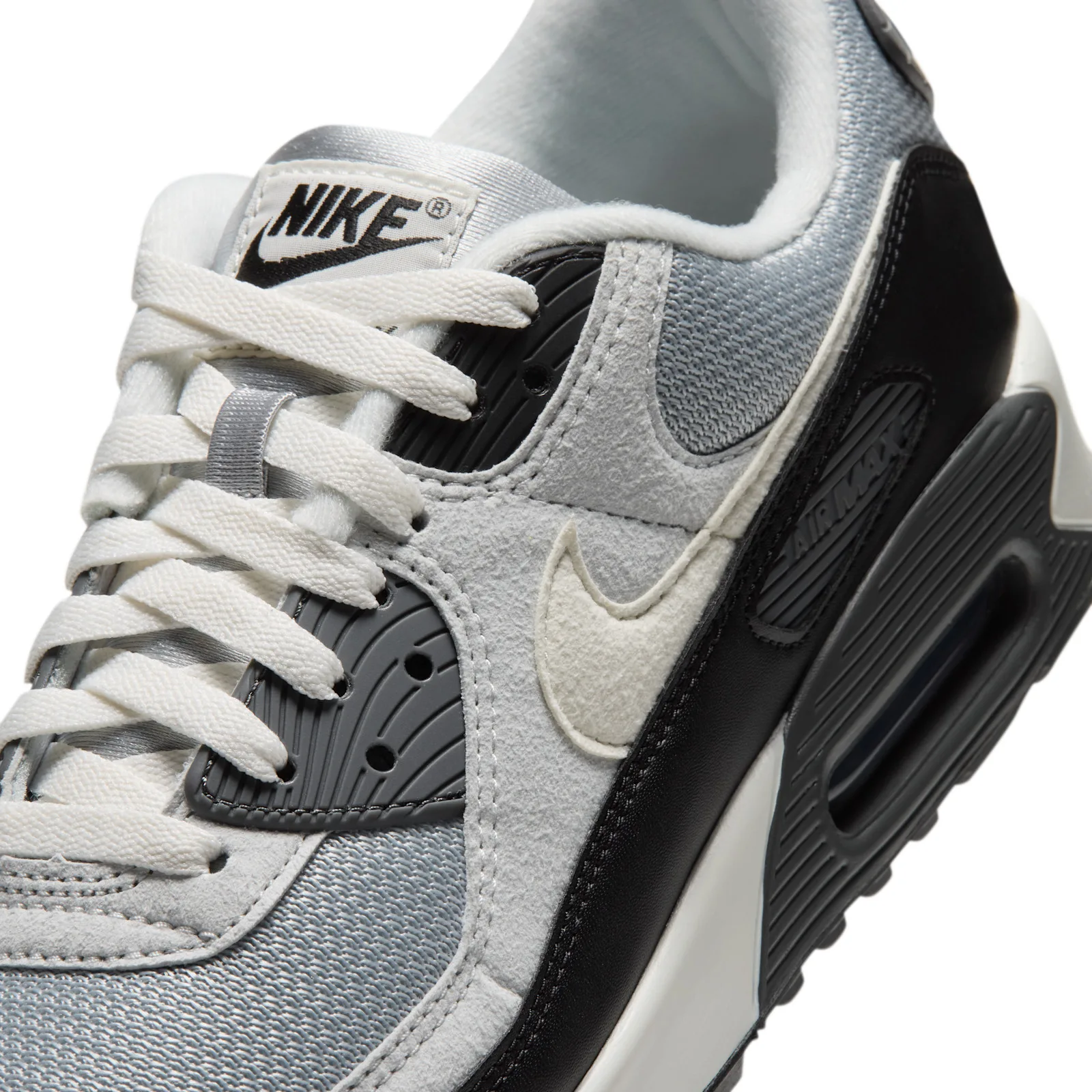 Detail of lacing and midfoot, cream laces, Nike tongue label, cream suede swoosh, dark grey eyestay, Light Smoke Grey