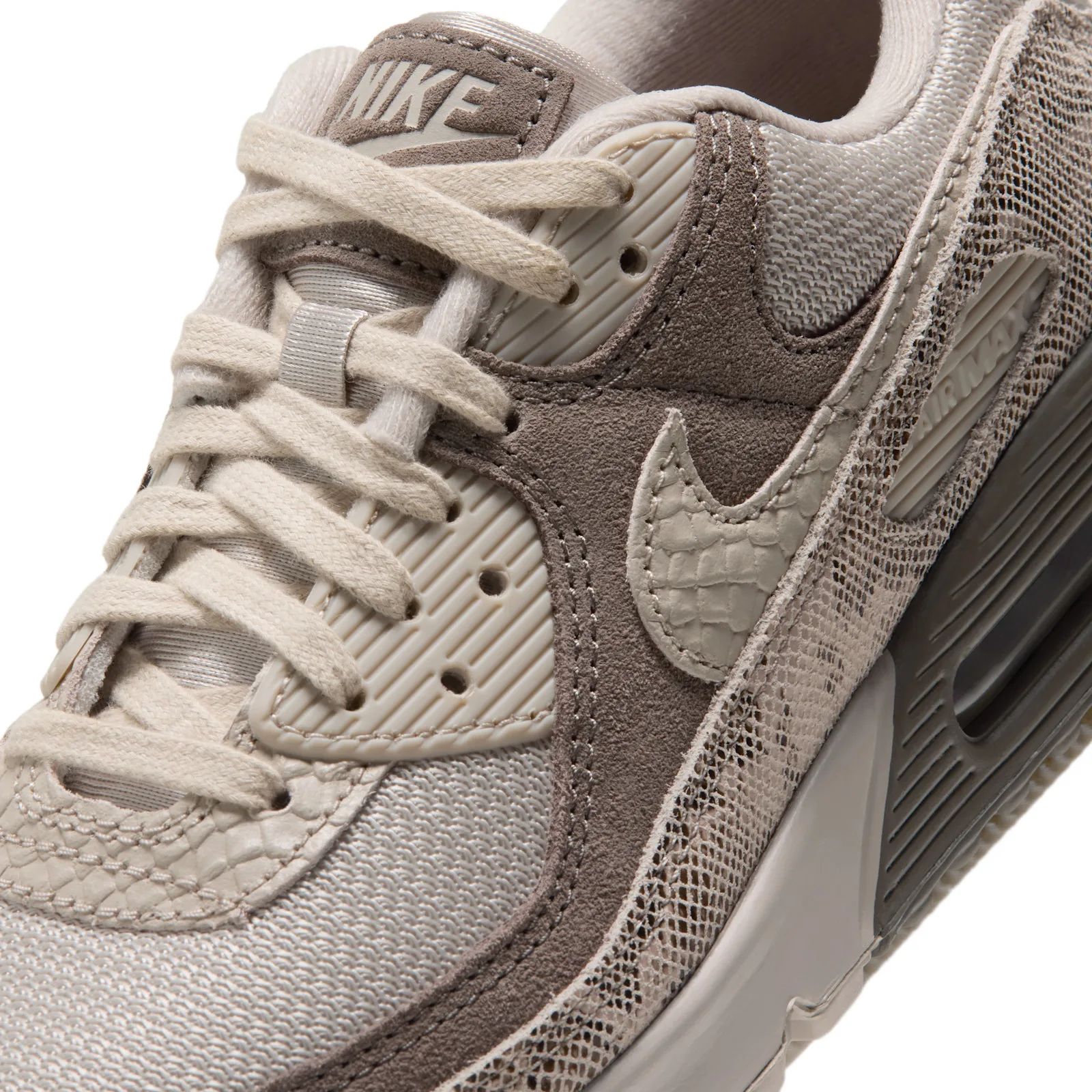 Upper detail with taupe suede, cream laces and a reptile-textured Swoosh, Python