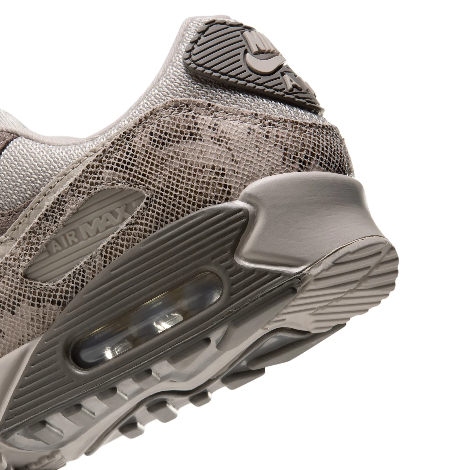 Heel detail with snakeskin texture, a ribbed Nike Air tab and visible Air unit, Python