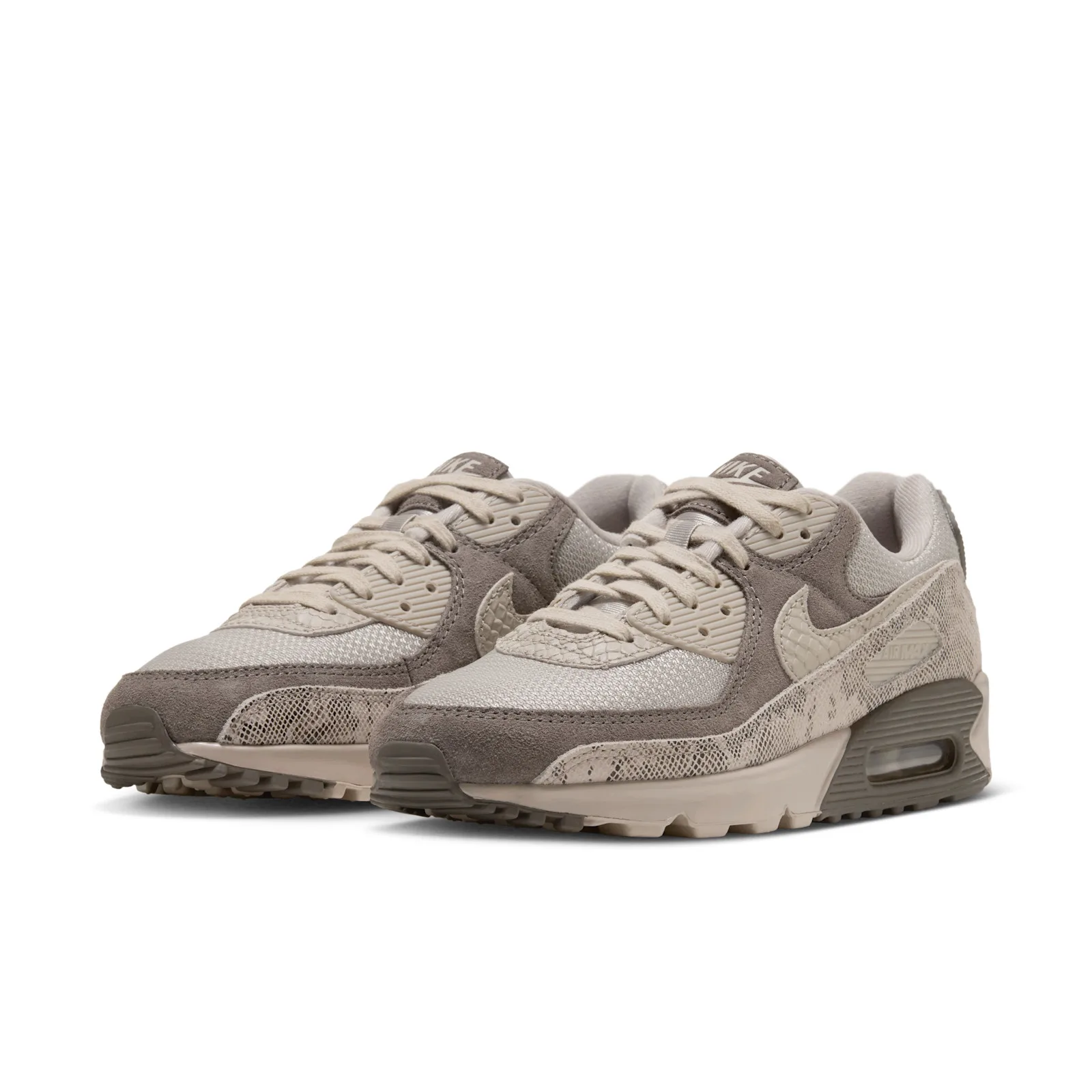 Pair at a front three-quarter angle with taupe suede and cream laces, Python