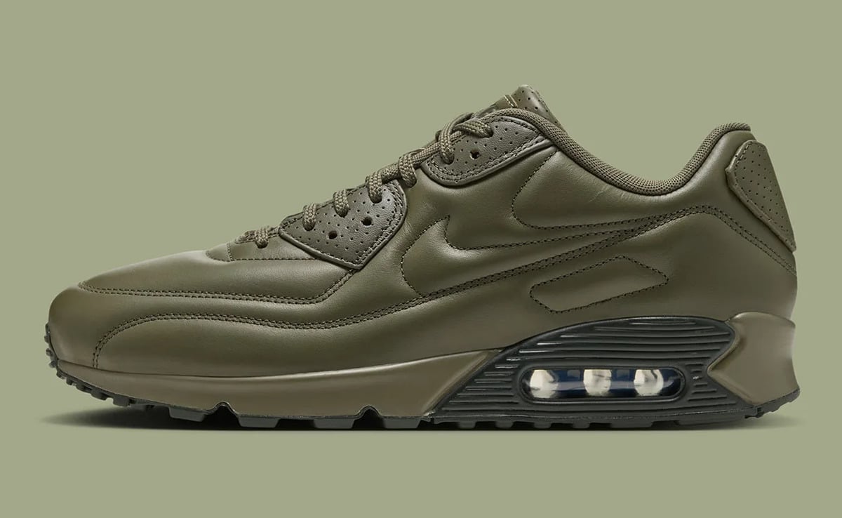 Lateral view, olive leather upper with stitched swoosh and dark ribbed heel Air window, Medium Olive