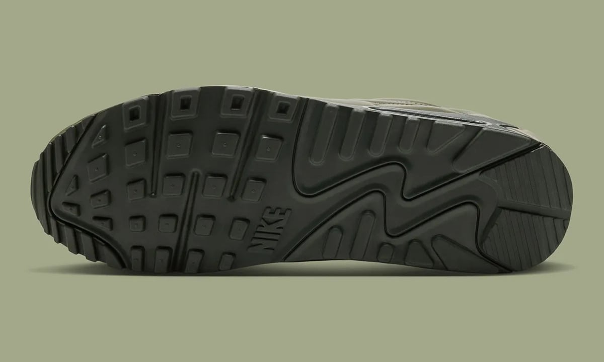 Outsole view, dark olive tread with square lugs, zigzag pattern and Nike logo, Medium Olive