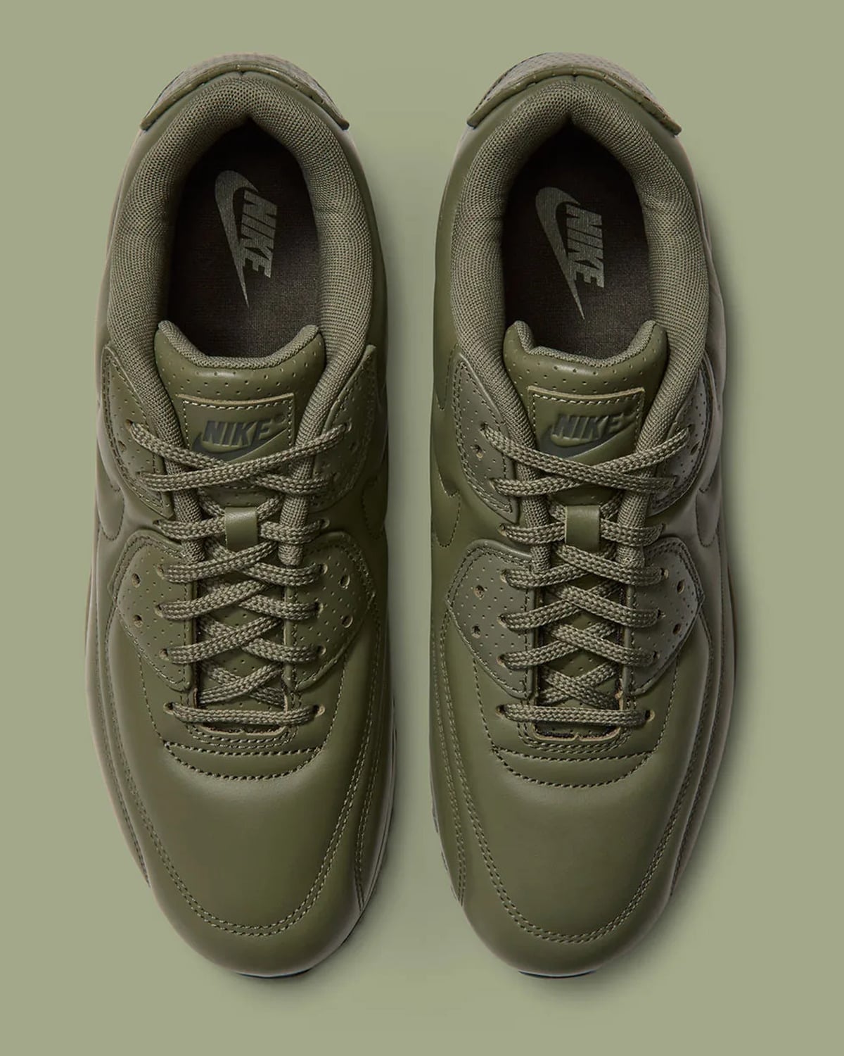 Top-down view of pair, olive laces and leather, Nike swoosh logos printed on insoles, Medium Olive