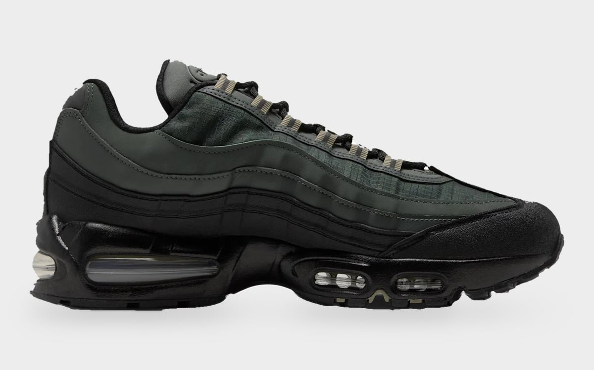 Medial view, dark green layered panels over black midsole with visible air units, Camo Green