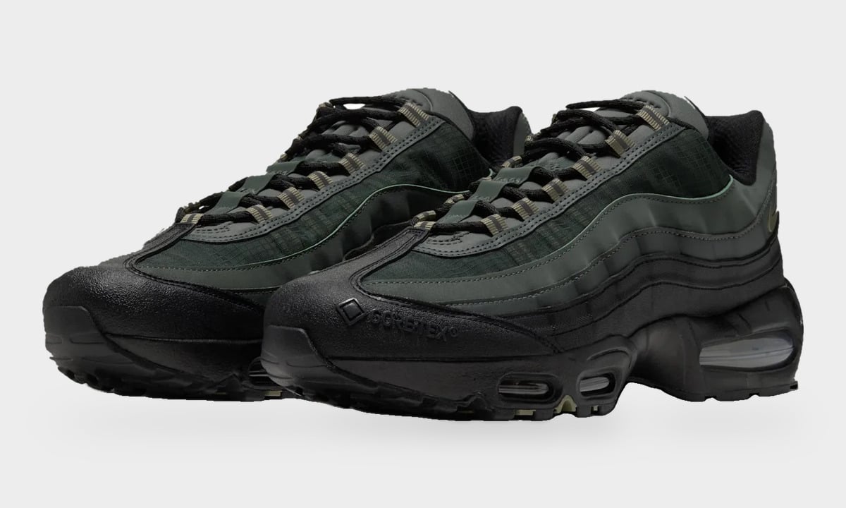 Pair, three-quarter view, black rubbery toe with GORE-TEX logo, dark green layered upper, Camo Green