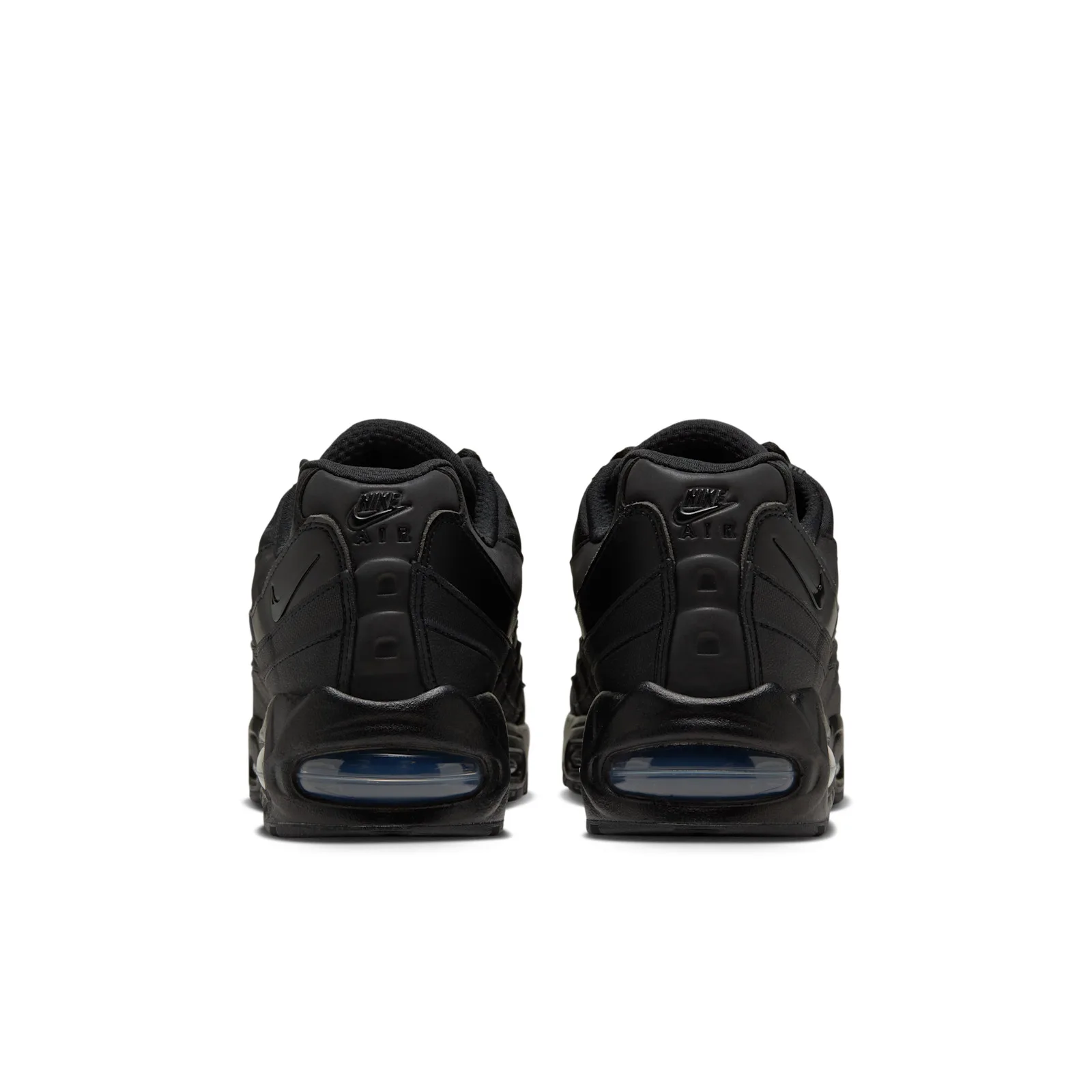 heel view of pair, white background, Nike Air text, navy air units visible, Triple Black