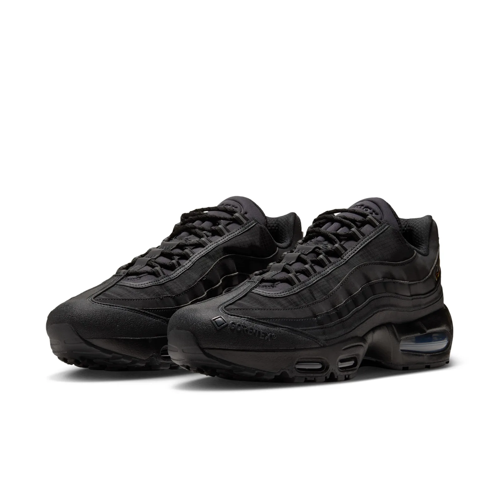 front three-quarter pair view, white background, Gore-Tex text and swoosh, Triple Black