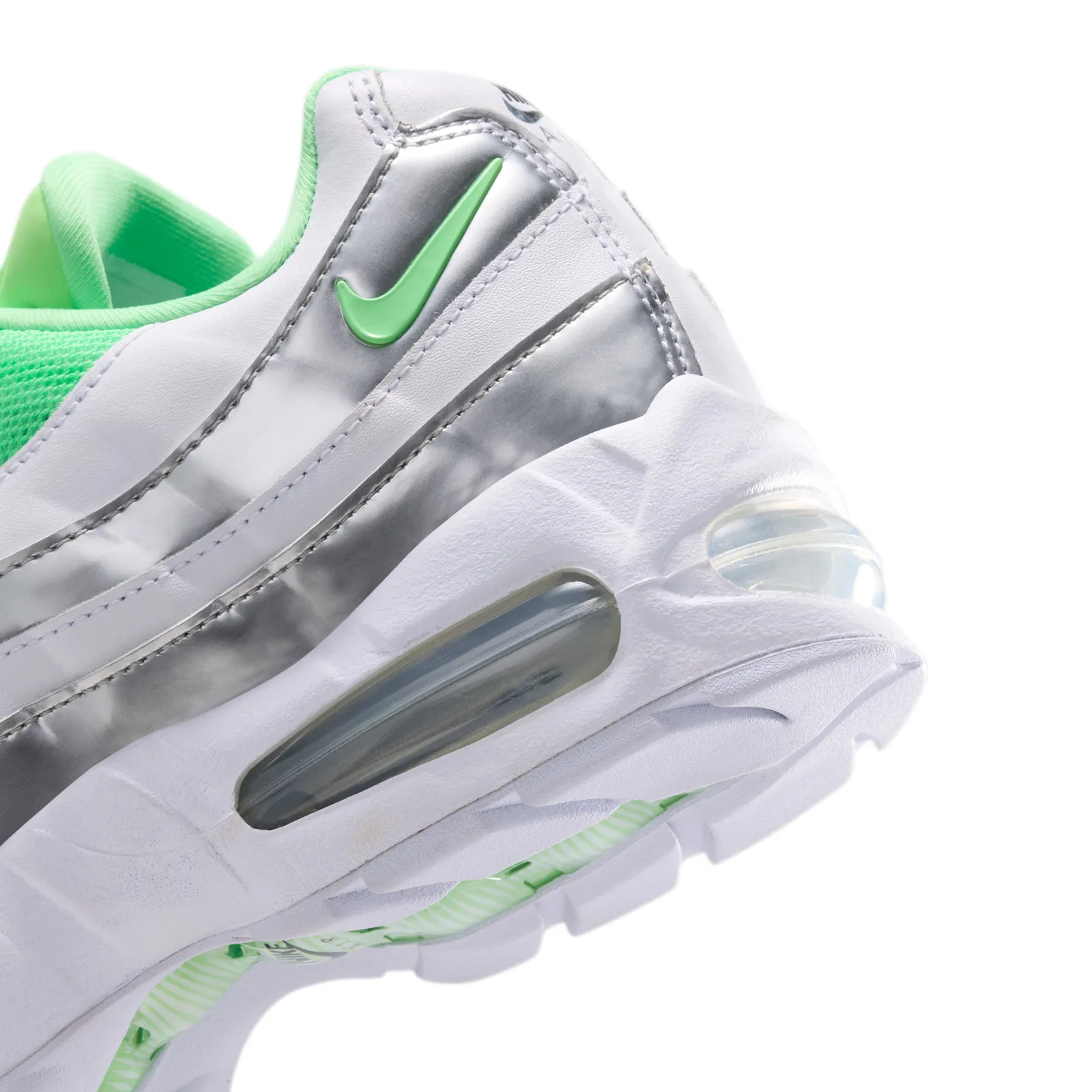 Heel detail with green swoosh, silver metallic panels and clear air unit, Illusion Green