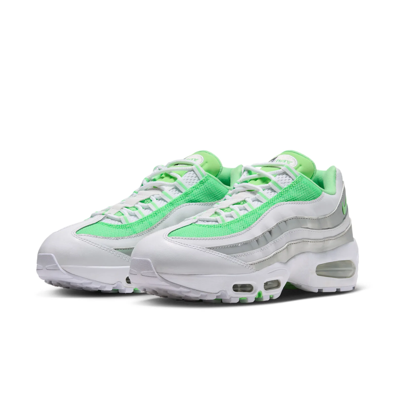 Pair at three-quarter angle with white laces, green mesh panels and silver stripes, Illusion Green