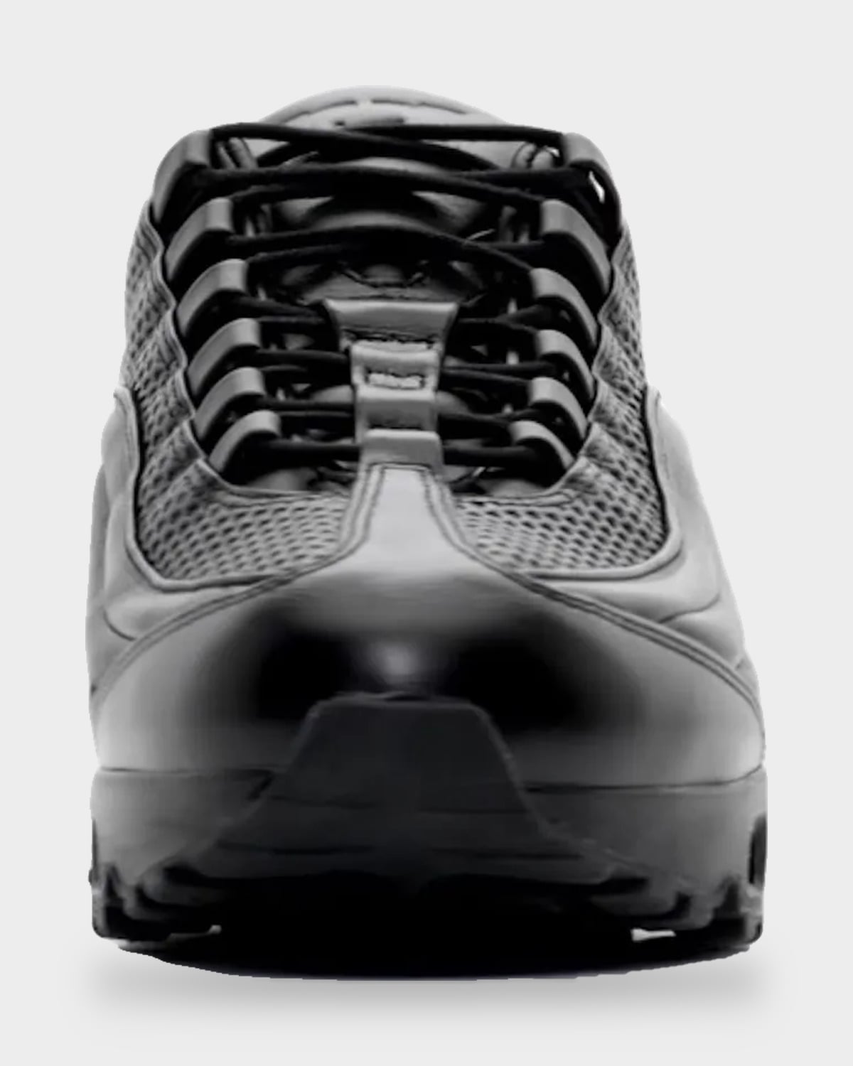 Front toe-on view, black laces and toe cap with grey-toned mesh panels, Black
