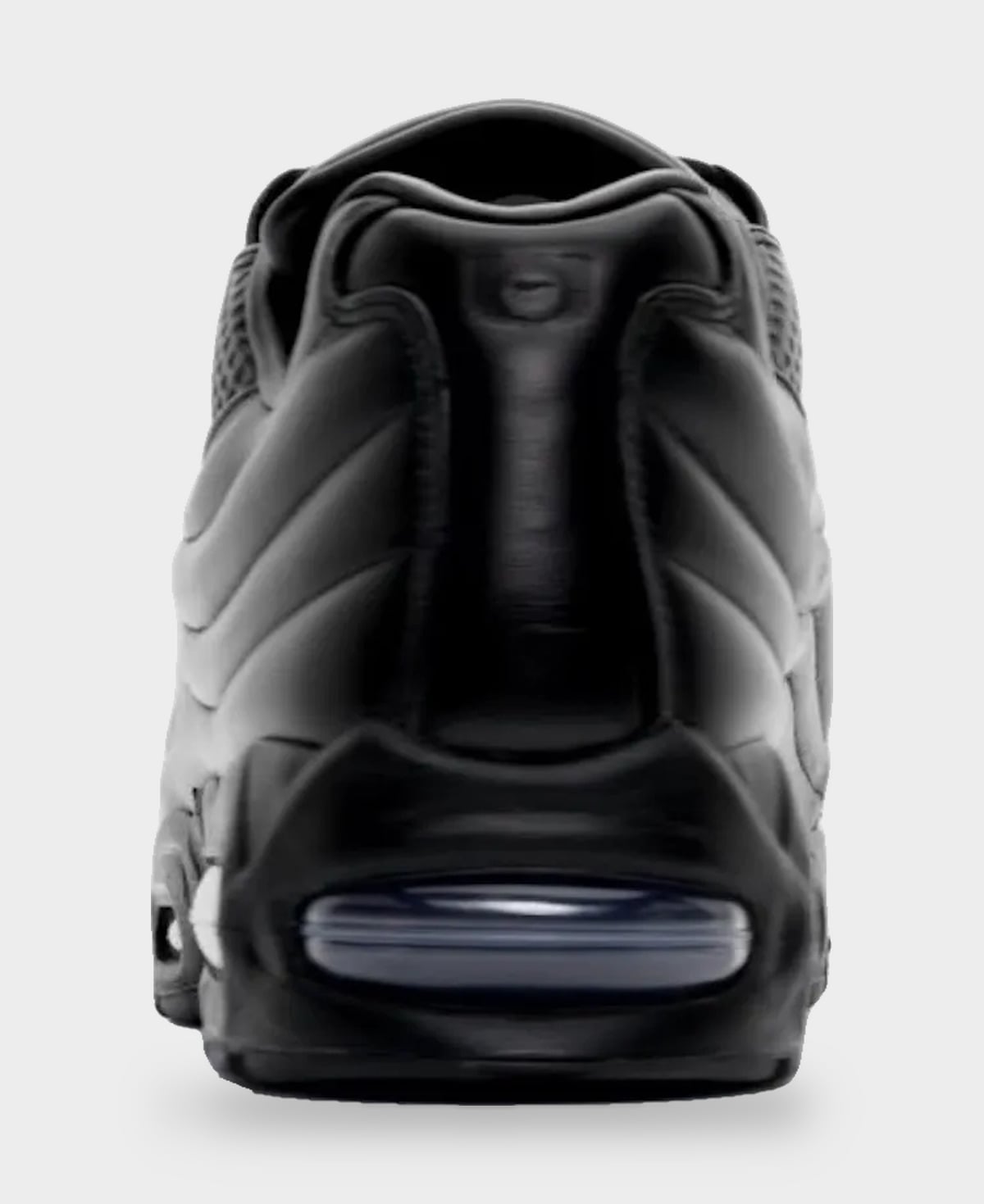 Heel view, black padded collar with small tab and clear Air window in the sole, Black
