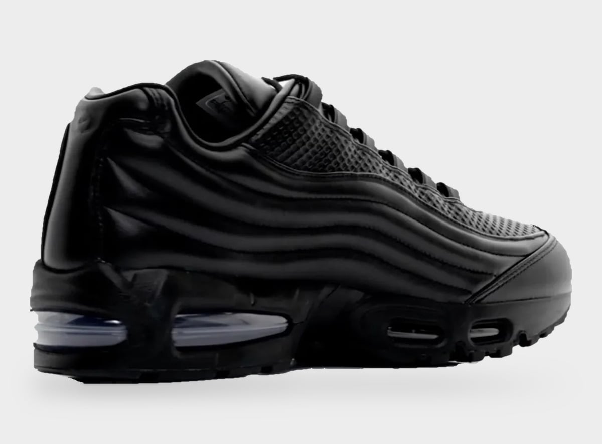 Rear three-quarter lateral view, black ridged leather with heel Air unit and small tongue label, Black
