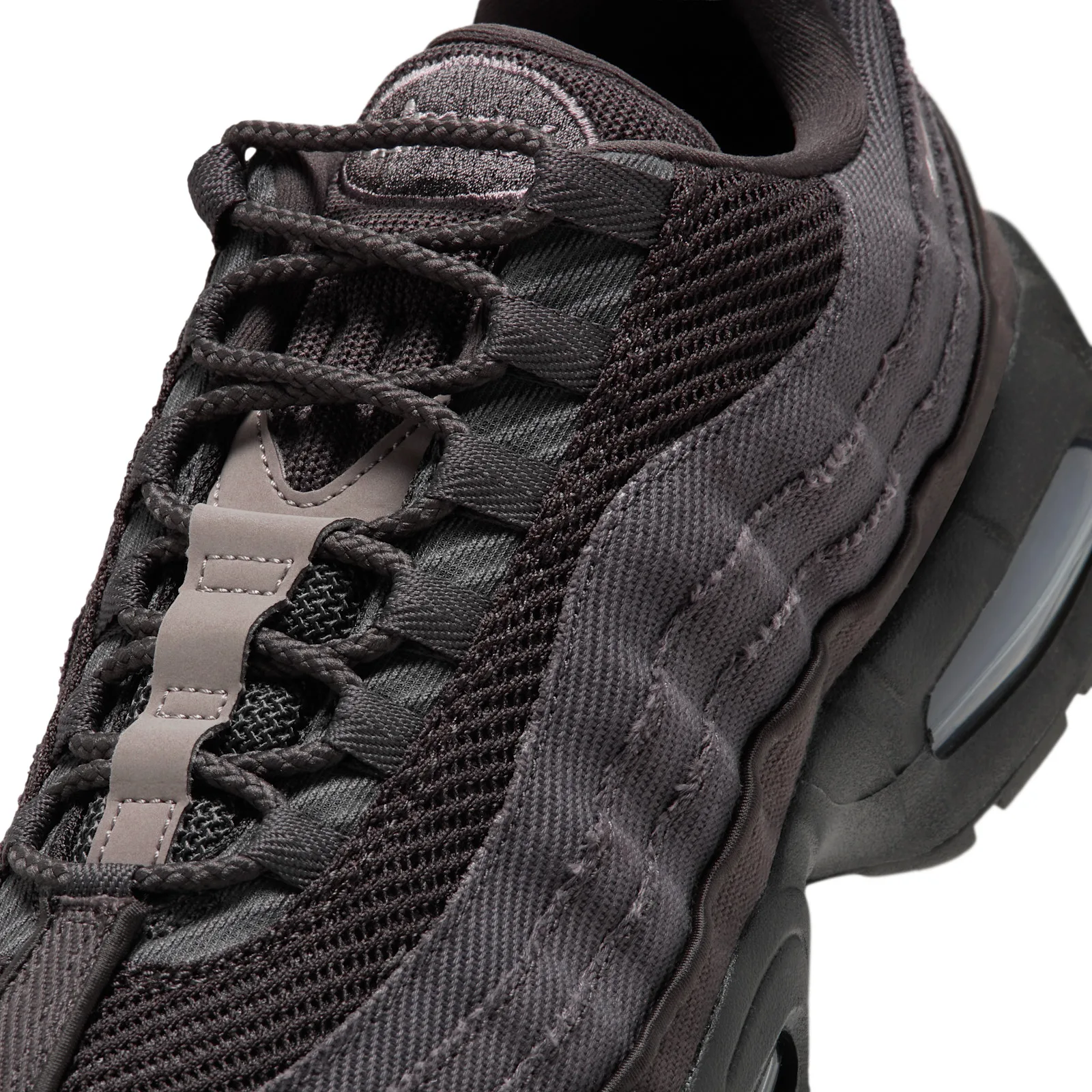 Detail of laces and midfoot, dark braided laces, taupe-grey lace tab, mesh and stitched twill panels, Medium Ash