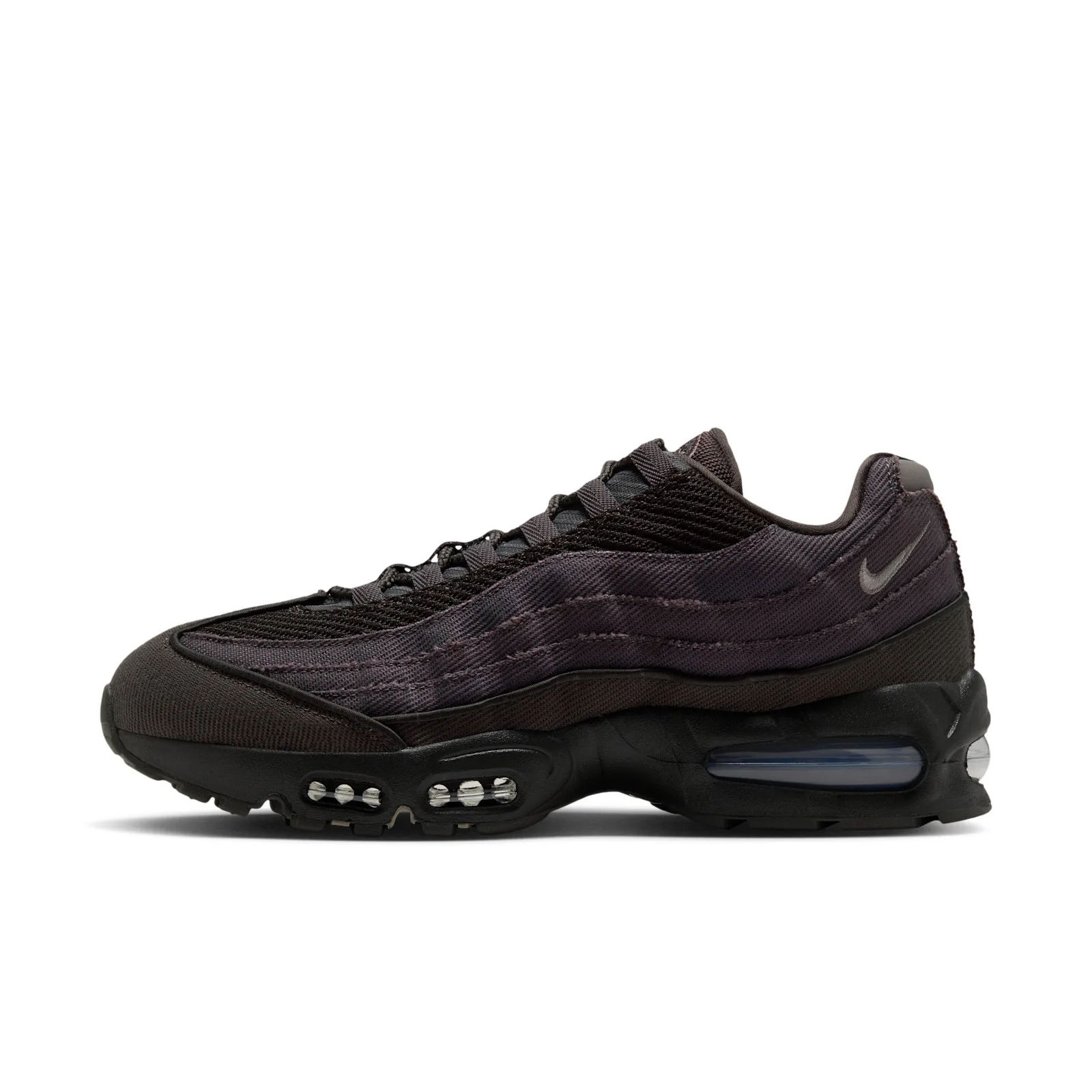 Lateral view on white, dark twill upper with stitched ridges, grey swoosh and blue-tinted heel air unit, Medium Ash