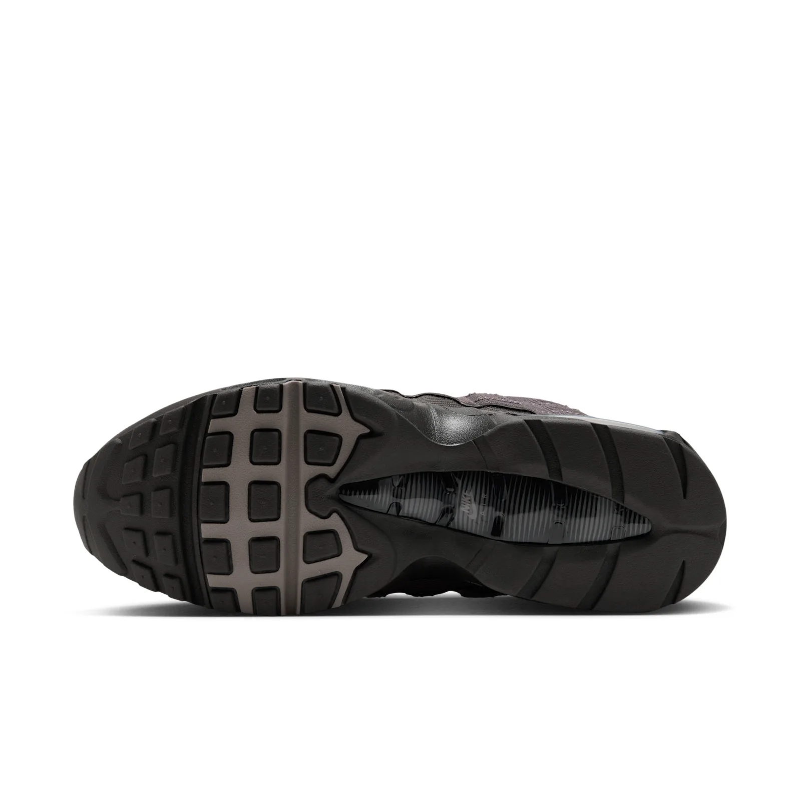 Outsole view, black rubber waffle-style tread with taupe-grey central ridge and clear heel window, Medium Ash