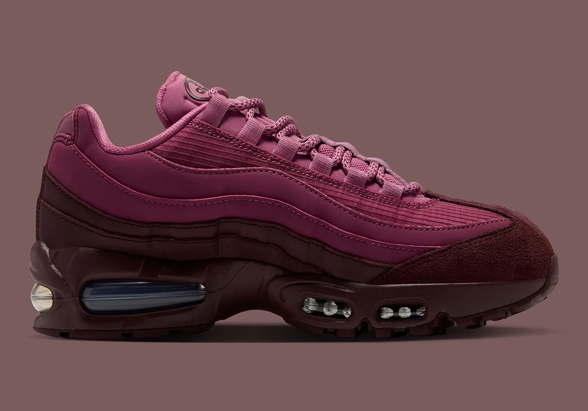 Medial view with pink upper, burgundy suede toe and visible blue heel air unit, Mystic Dates