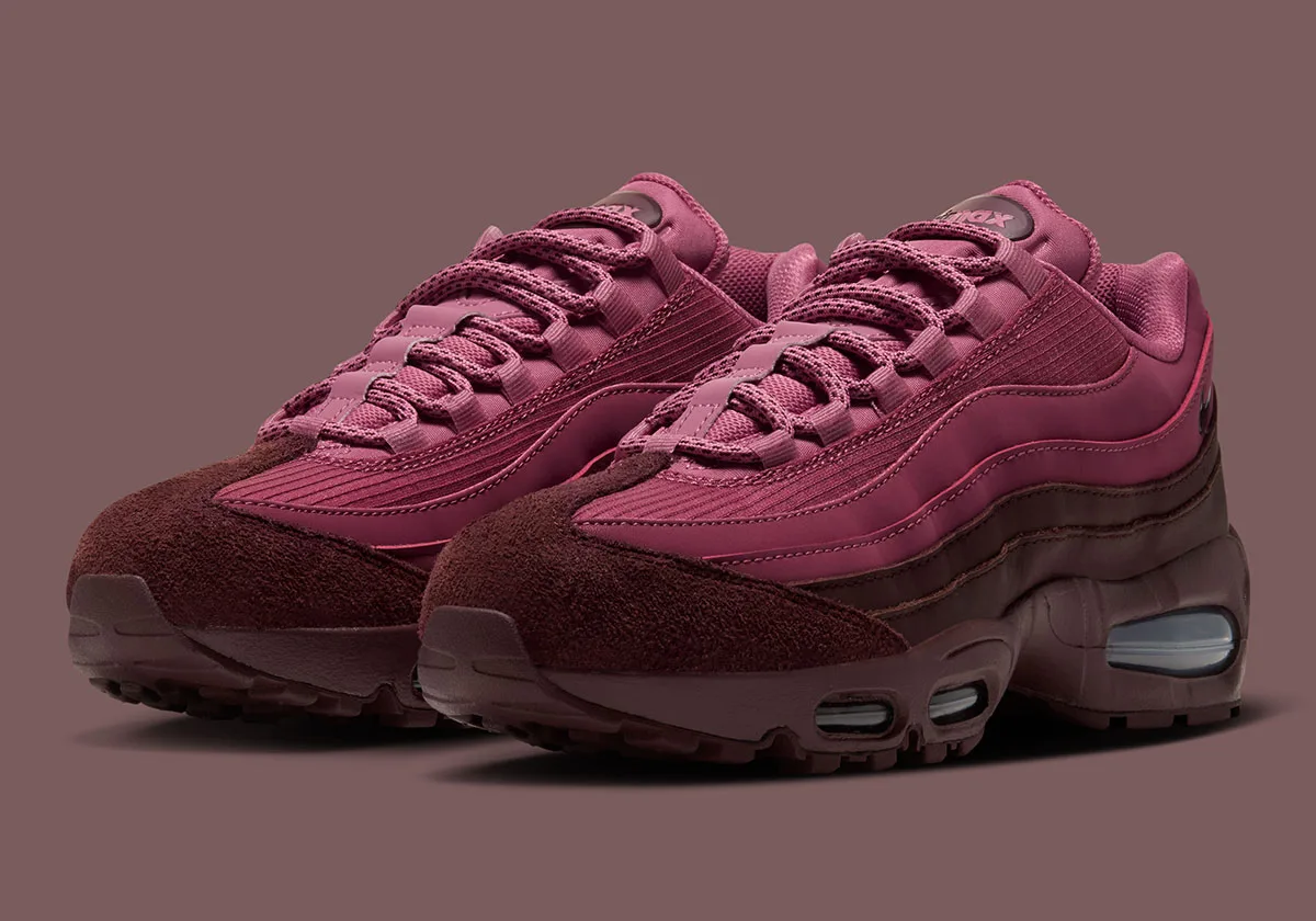 Pair at three-quarter angle, pink laces, burgundy suede toes, brown backdrop, Mystic Dates
