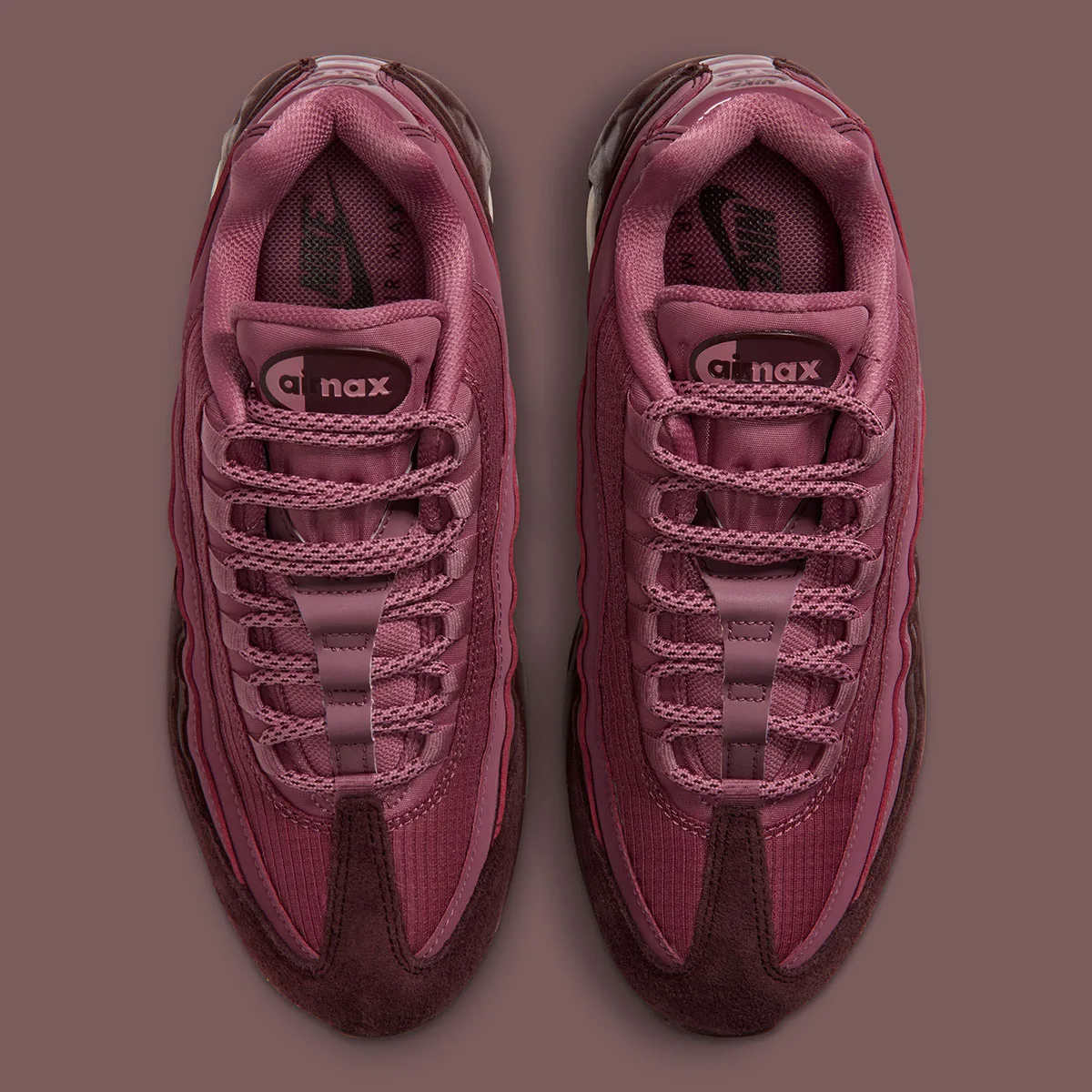 Top-down view of pair, pink laces, airmax tongue logo, burgundy suede toes, Mystic Dates